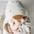 cape de bain bébé capuche avec motif visage oie bec et pattes éponge coton bio sable