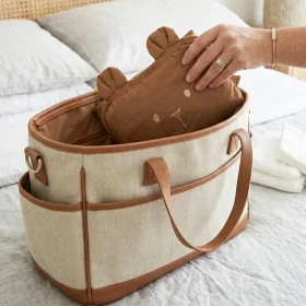 tapis à langer nomade imperméable ourson caramel en coton bio et pvc fermeture facile élastique